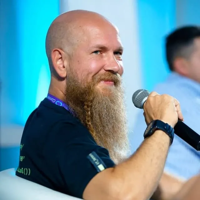 Oleg Reshetnikov speaking at a professional event in Cyprus