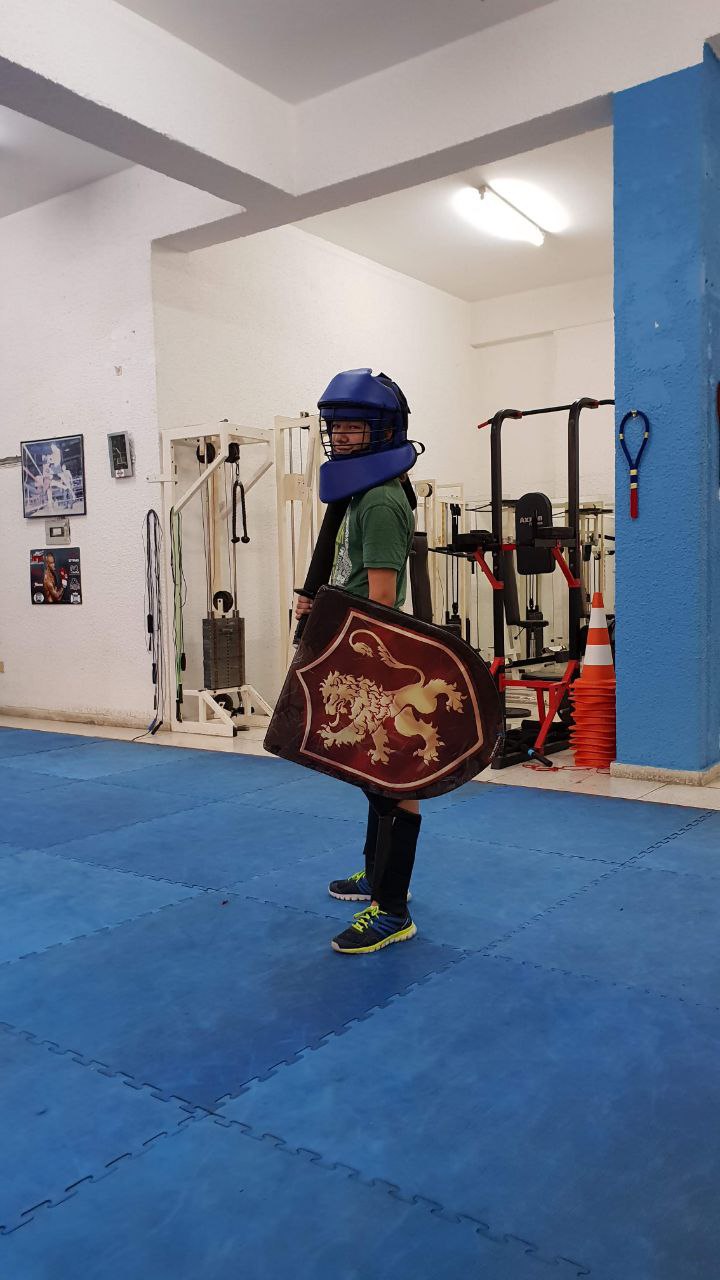 Nikita before the injury, at sword-fighting practice.